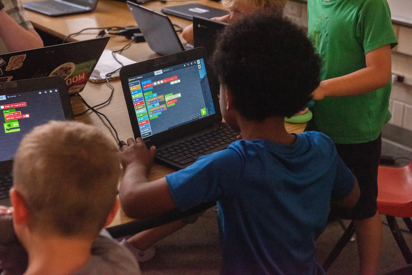 Students working together during an Athena coding class