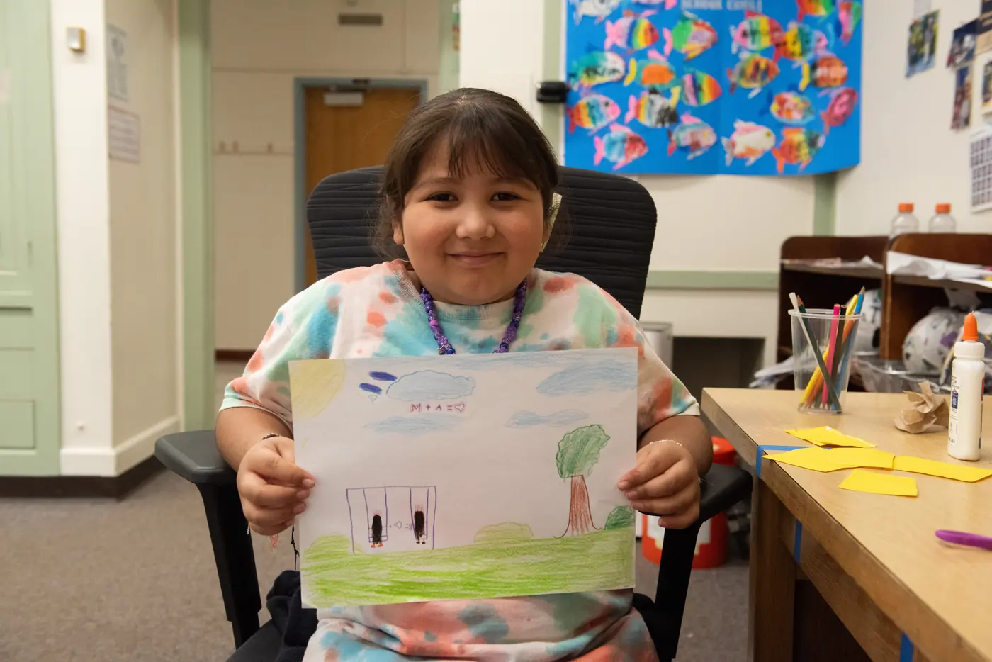 A student sharing a finished project from an Athena enrichment class